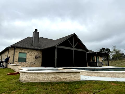 V-Track motorized screen at pool home