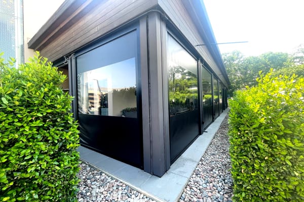 V-Track motorized screen on modern home