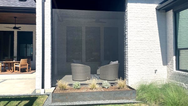 Outdoor screen on covered patio