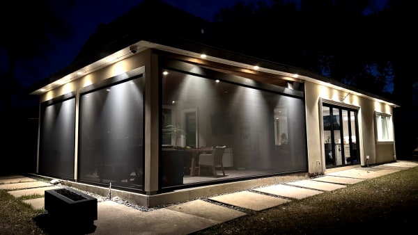 V-Track motorized screen night installation view