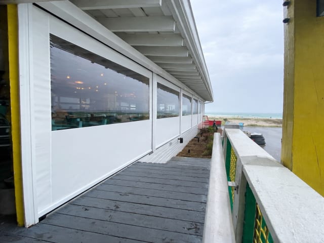 V-Track screen system on covered patio in Austin