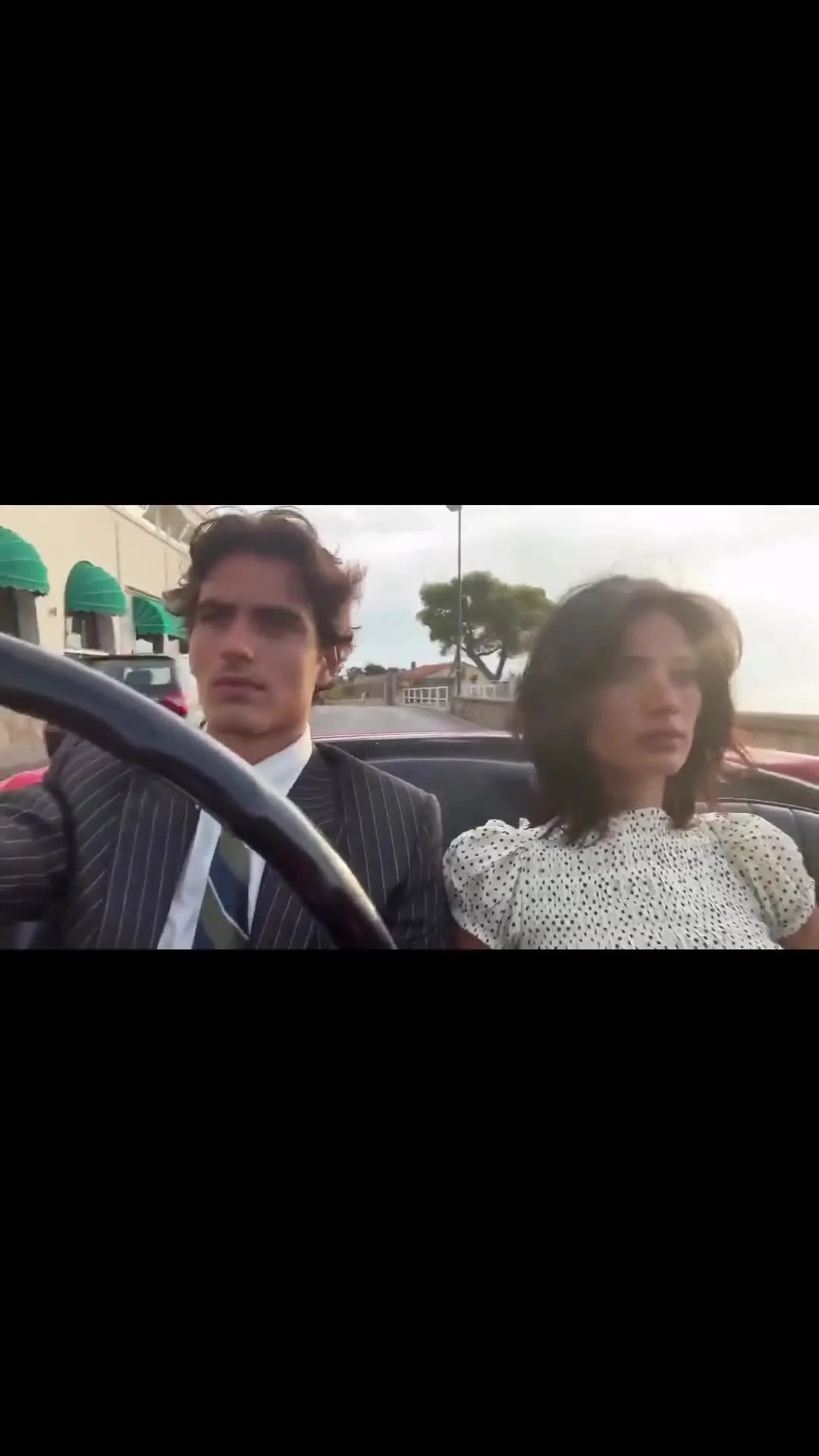 Couple Driving In a Car