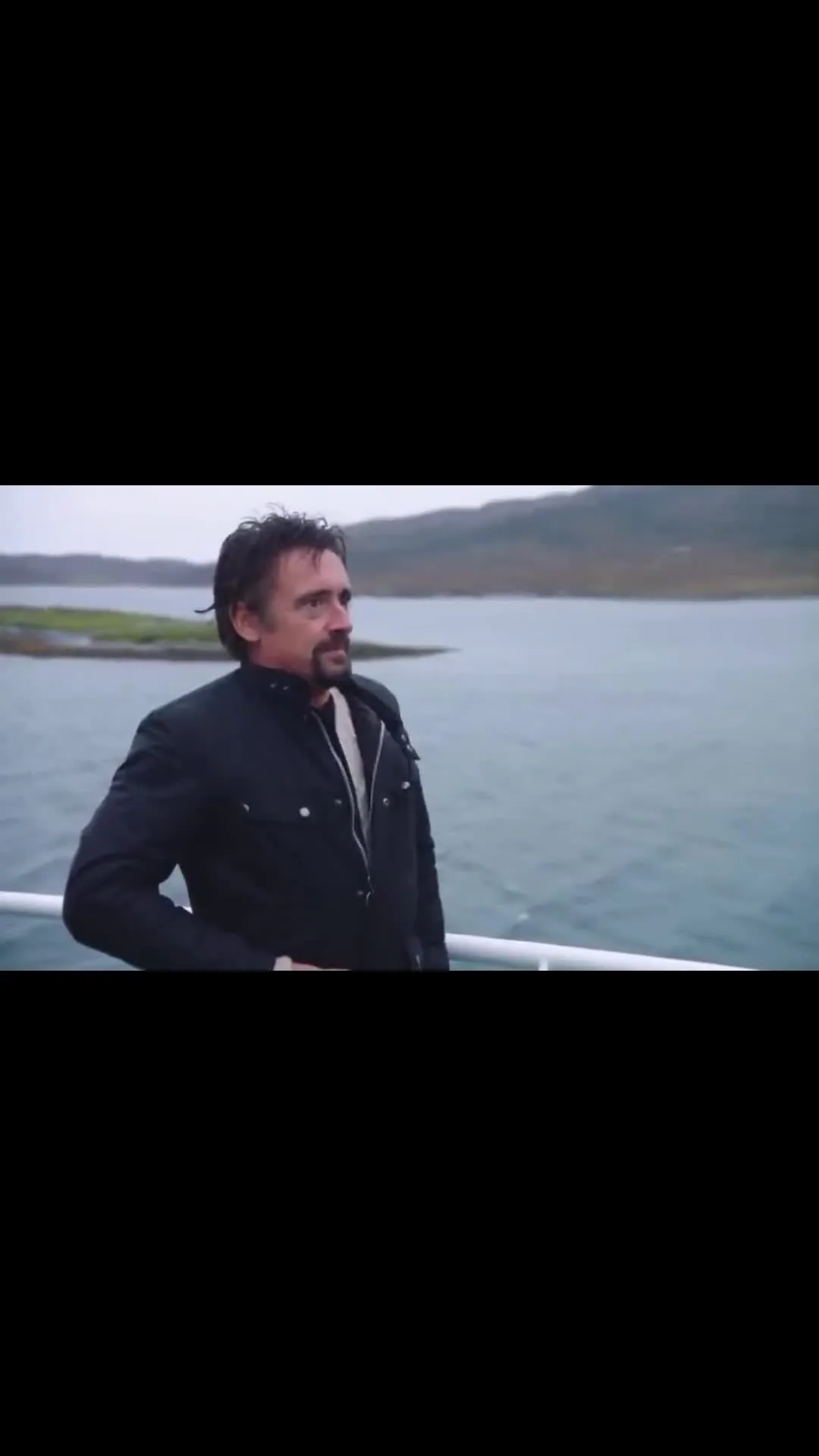 Three Guys looking at each other on a boat