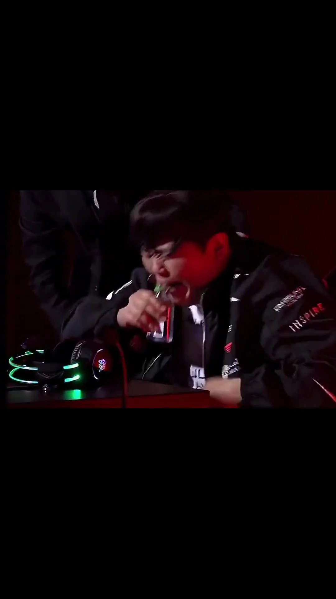 Asian Man Drinking and Crying