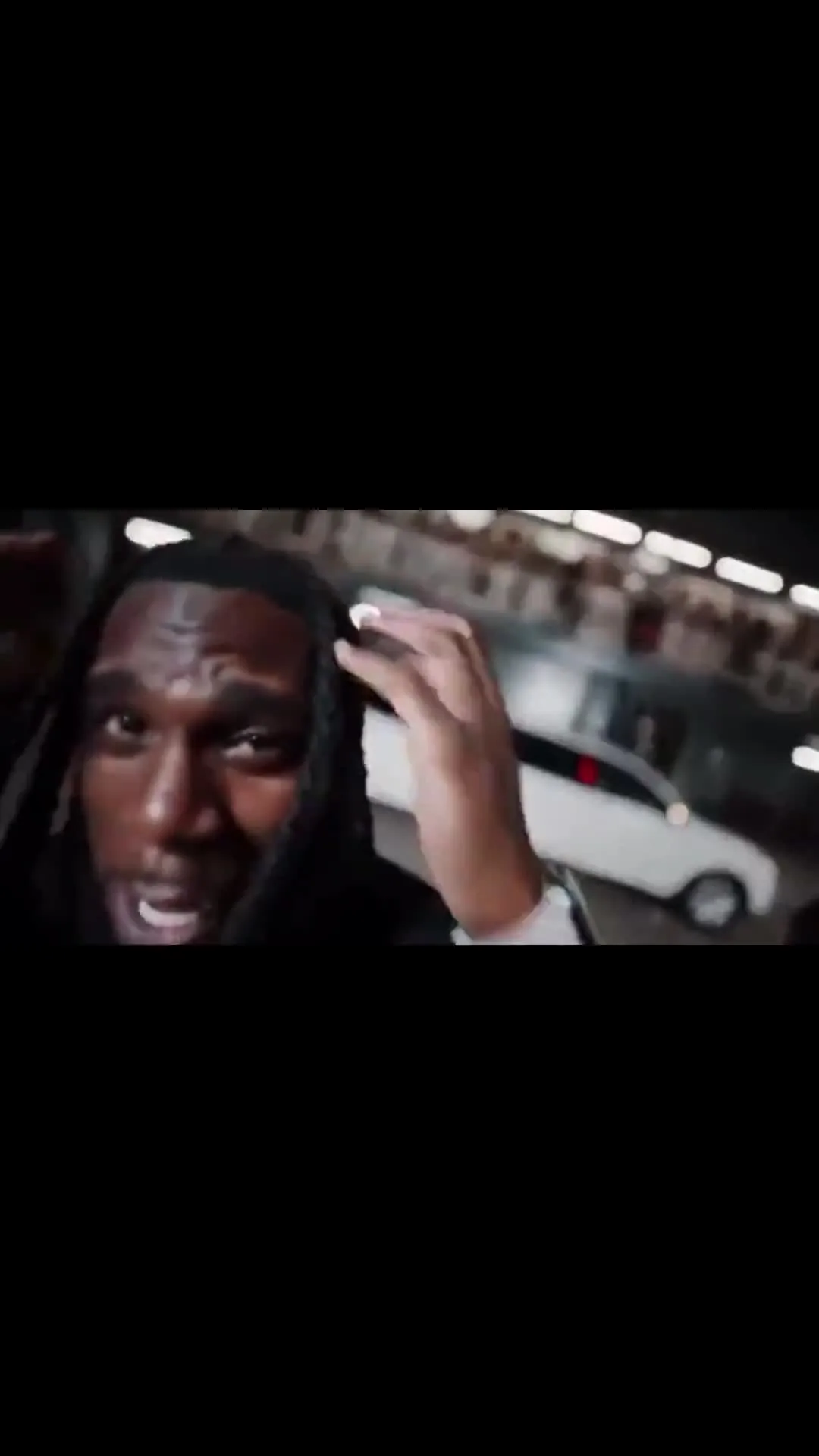 Burna Boy Flexing His VVS Chain