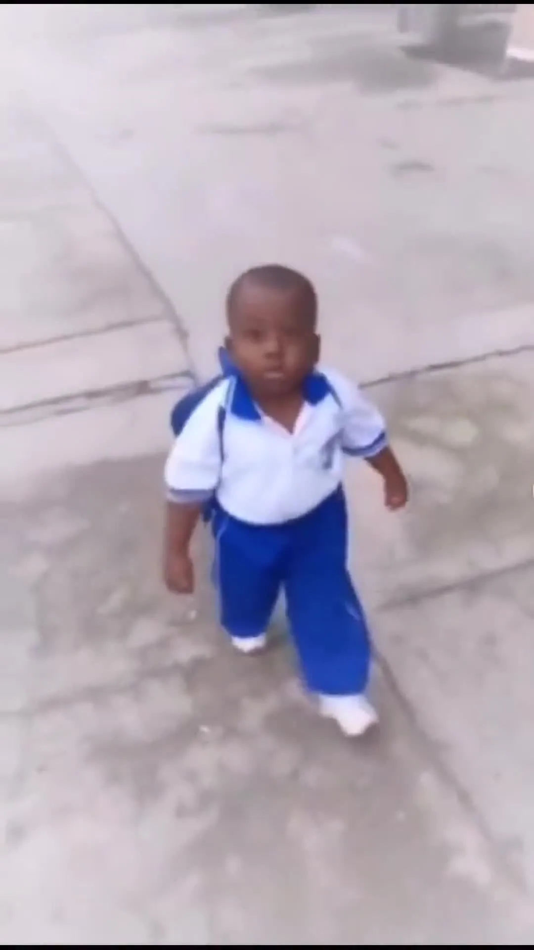 Kid Walking to School with Serious Face