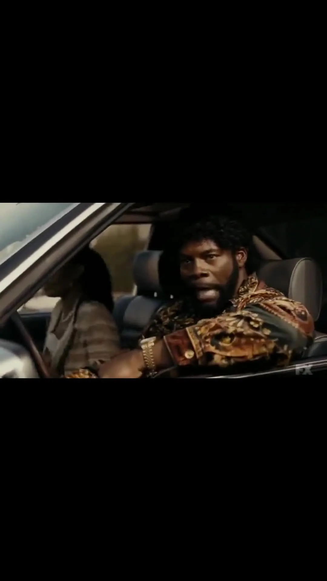 Jerome Watching Passenger Act Up in Car