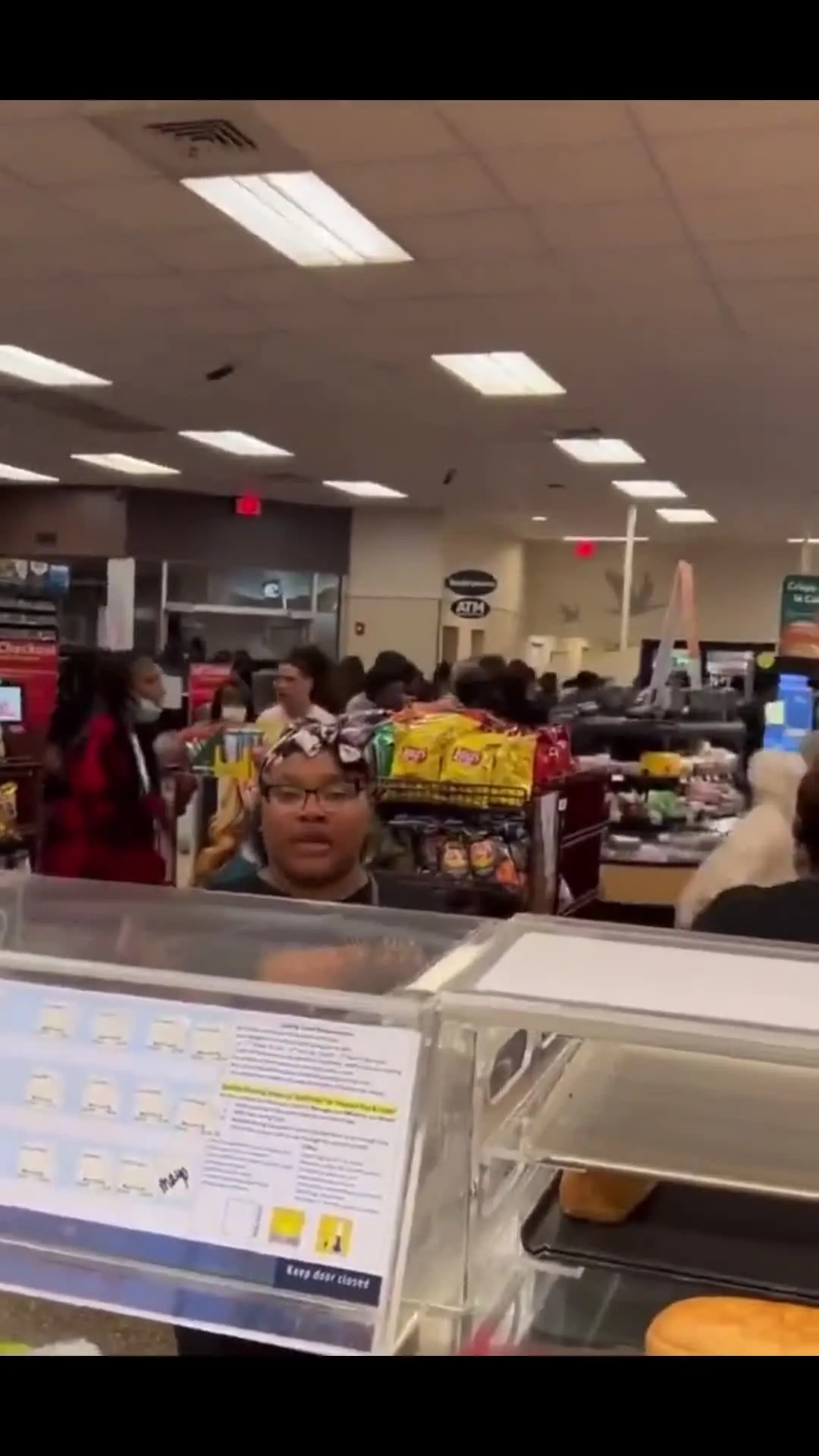Girl Asking About Sandwiches During Fight Behind Her