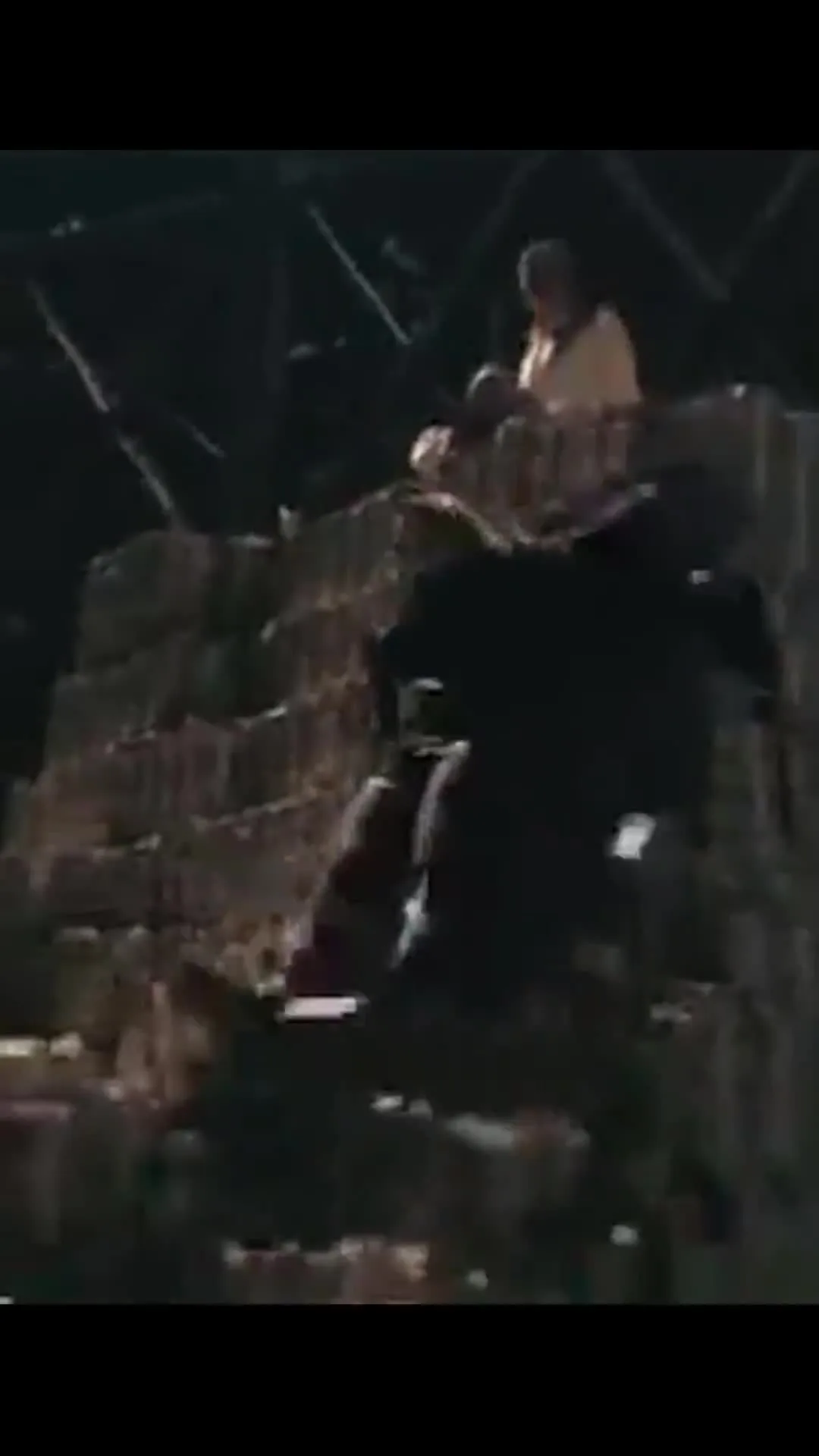 Joker Sliding Down Pile of Cash