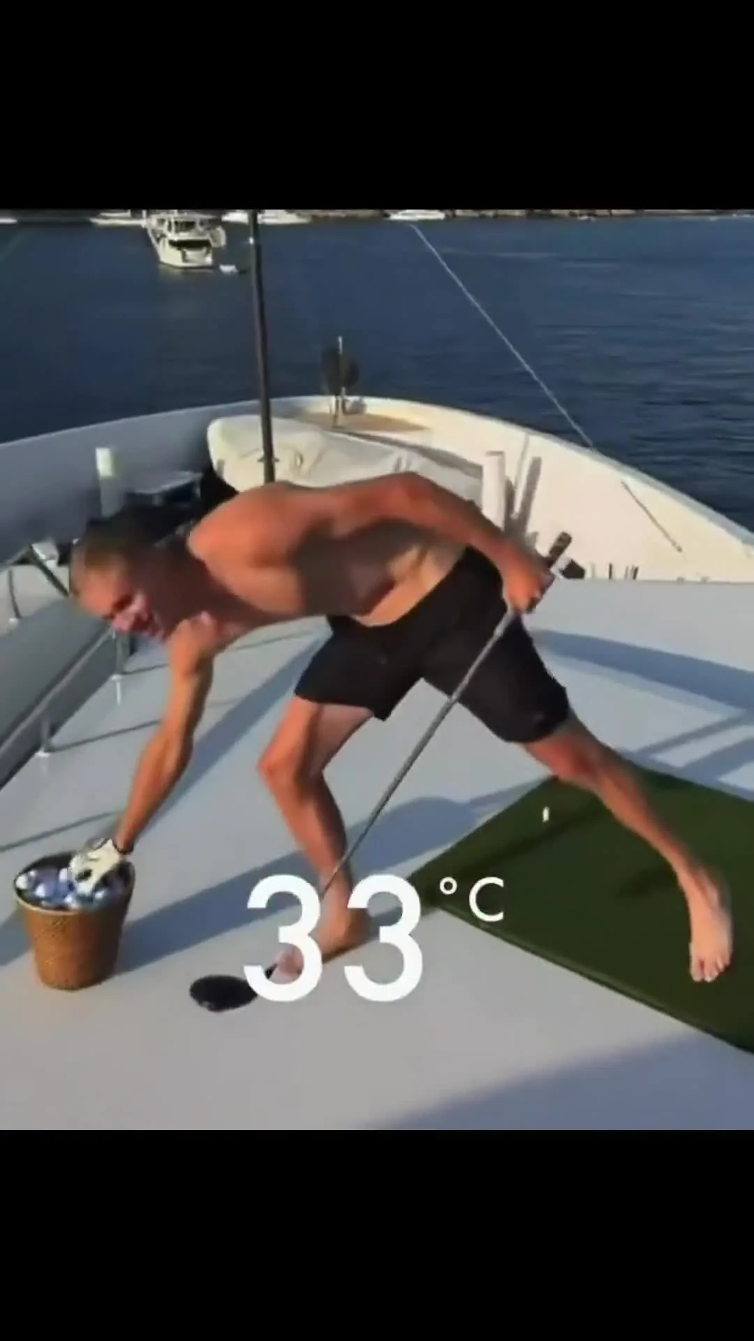 Erling Haaland on a boat golfing
