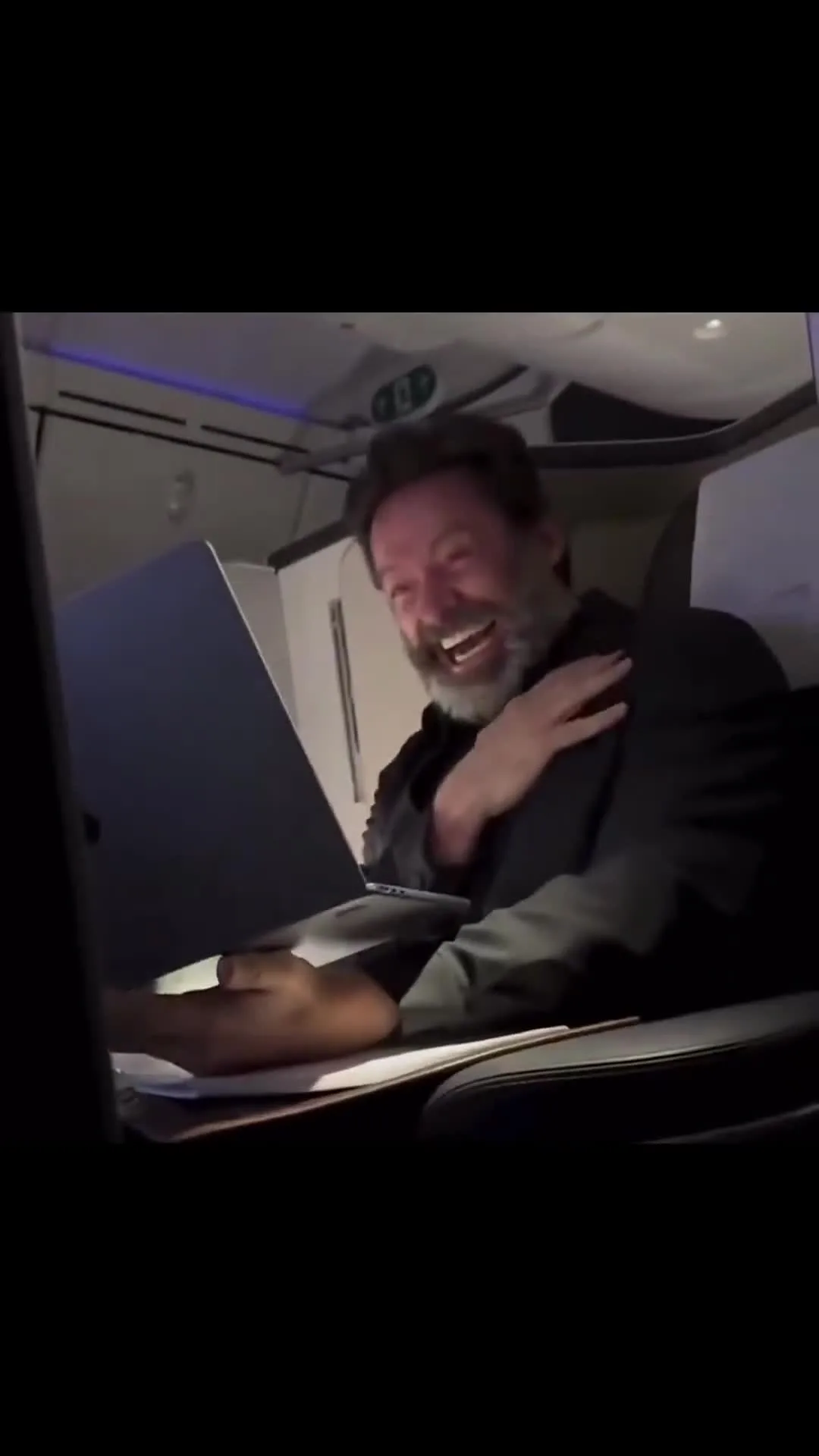 Hugh Jackman Plane Laugh