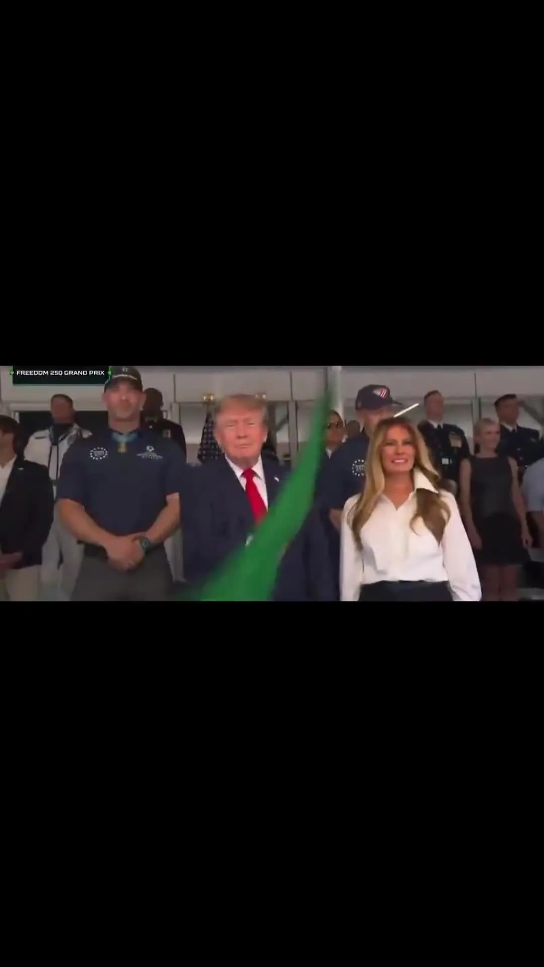 Trump waving green flag