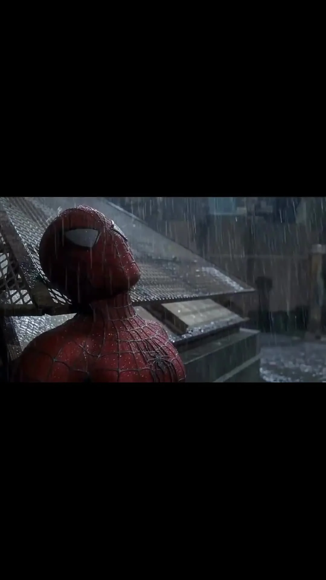 Depressed Spider-Man in the rain