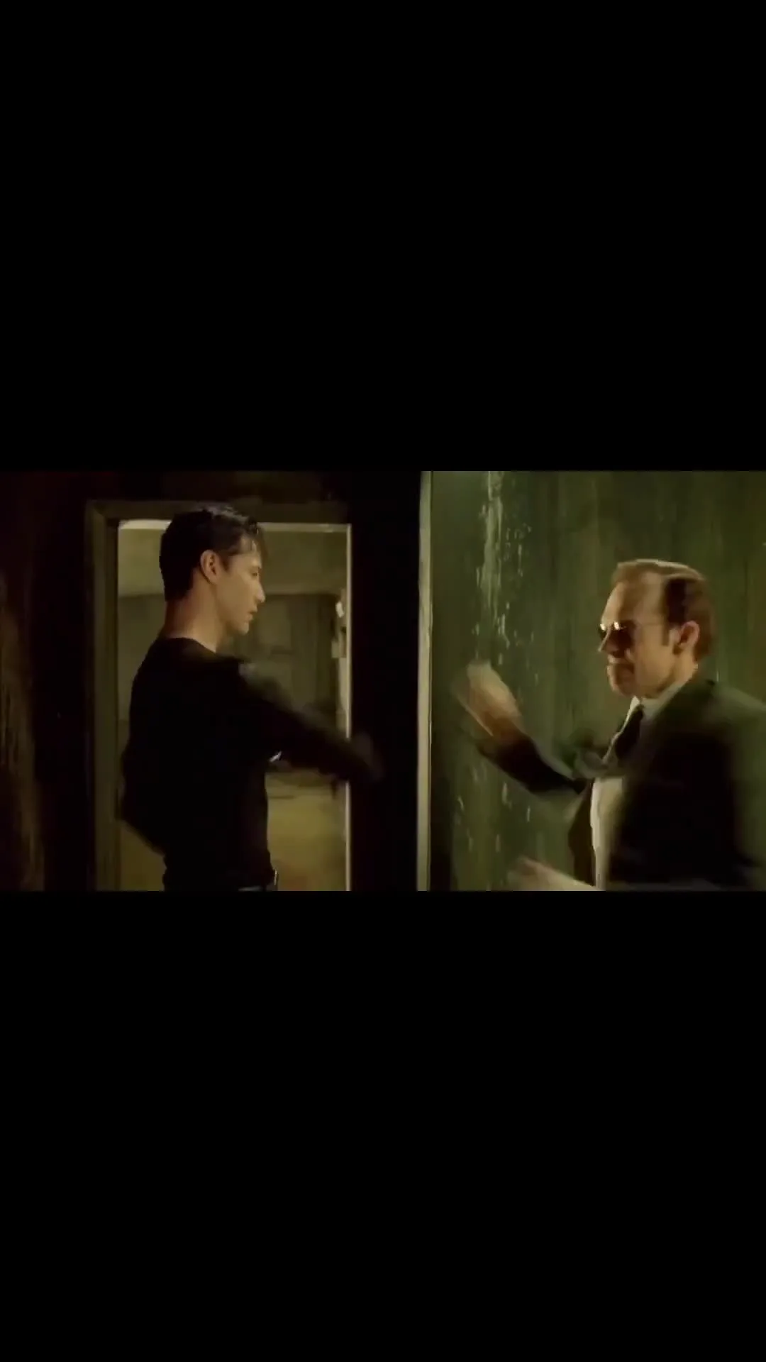 Keanu Reaves blocking punches