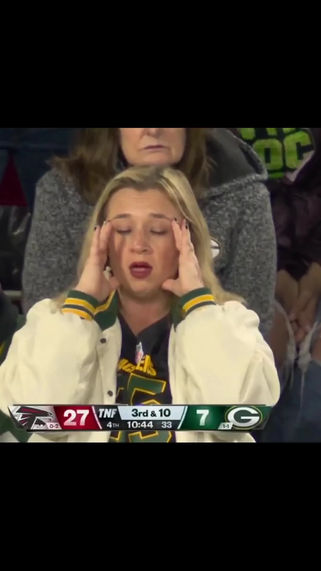 Green Bay Packers fan checking pulse