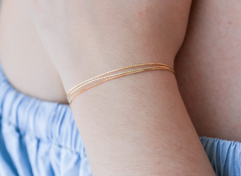 Pulseira Trio de Fitas Douradas banhada a ouro 18k — TK Semijoias
