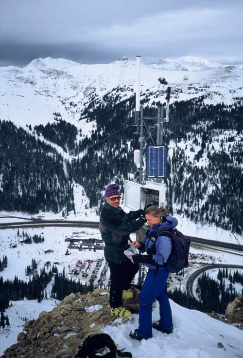 Historical photo of weather station work