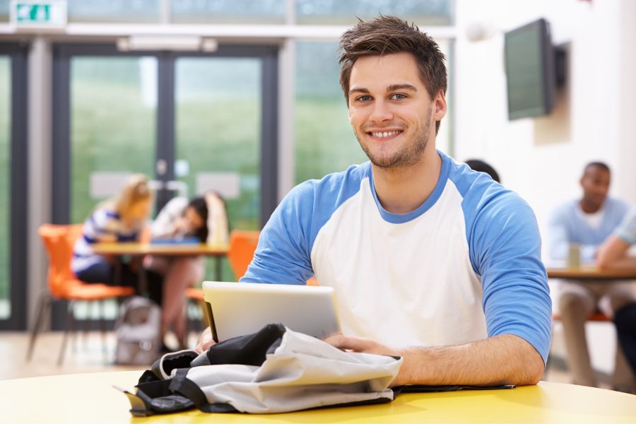 student studying at smu after paying for university fees