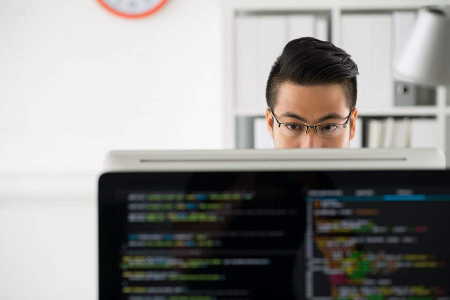 web developer writing code