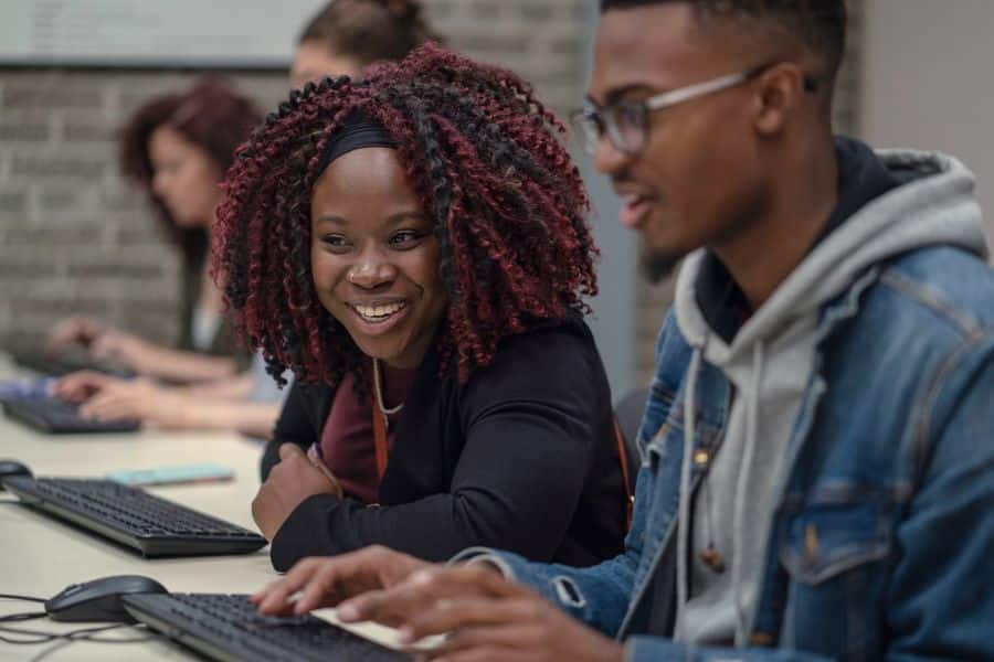 students filling out form for second semester applications