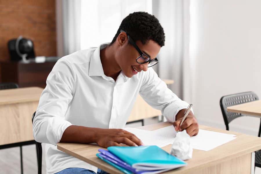 student paying university fees for smu