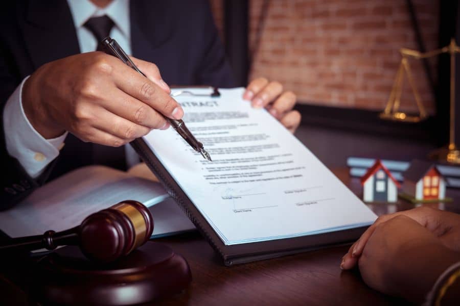 person ensuring their job contracts are legal