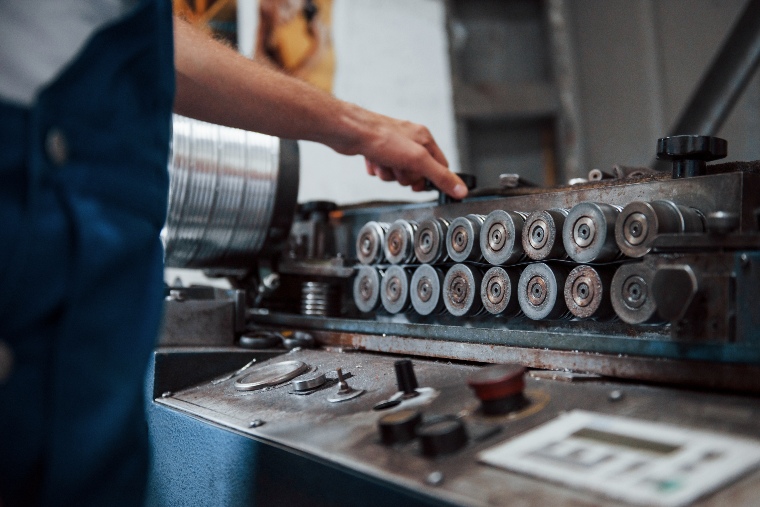 Millwright fixing a machine