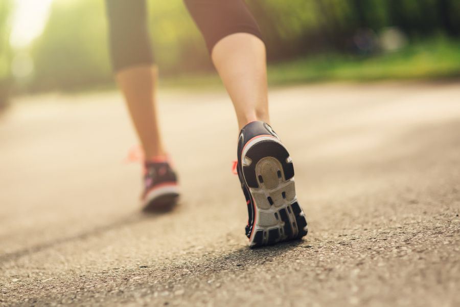 student jogging at university campus