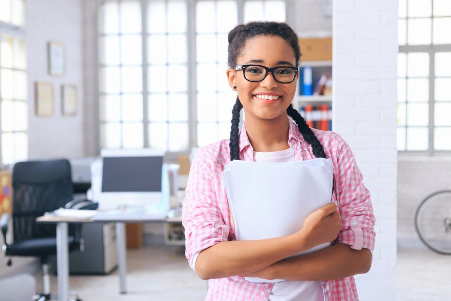 student handing in supporting documentation for 2024 nsfas application