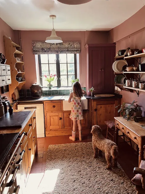 Farmhouse kitchen girl and dog