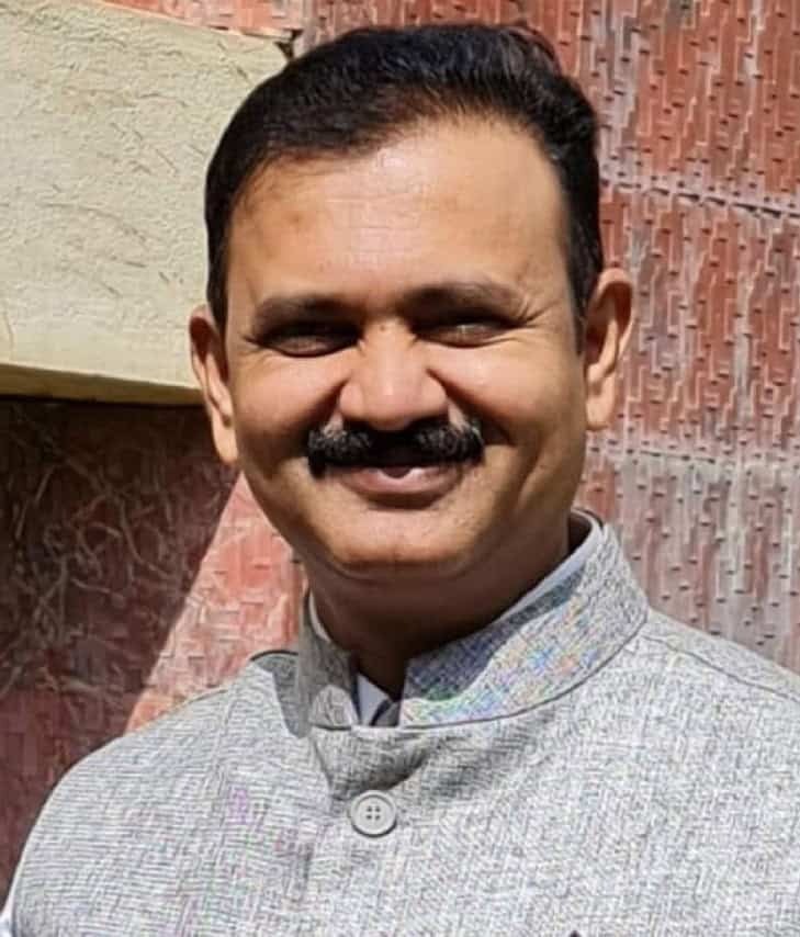 Dr. Anil B Patil, President, KOA