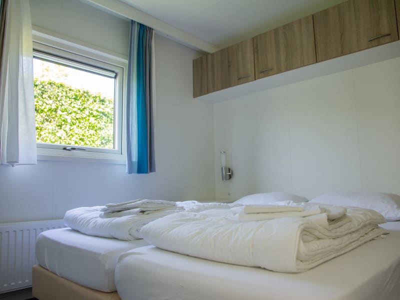 Ouderslaapkamer met boxspringbedden