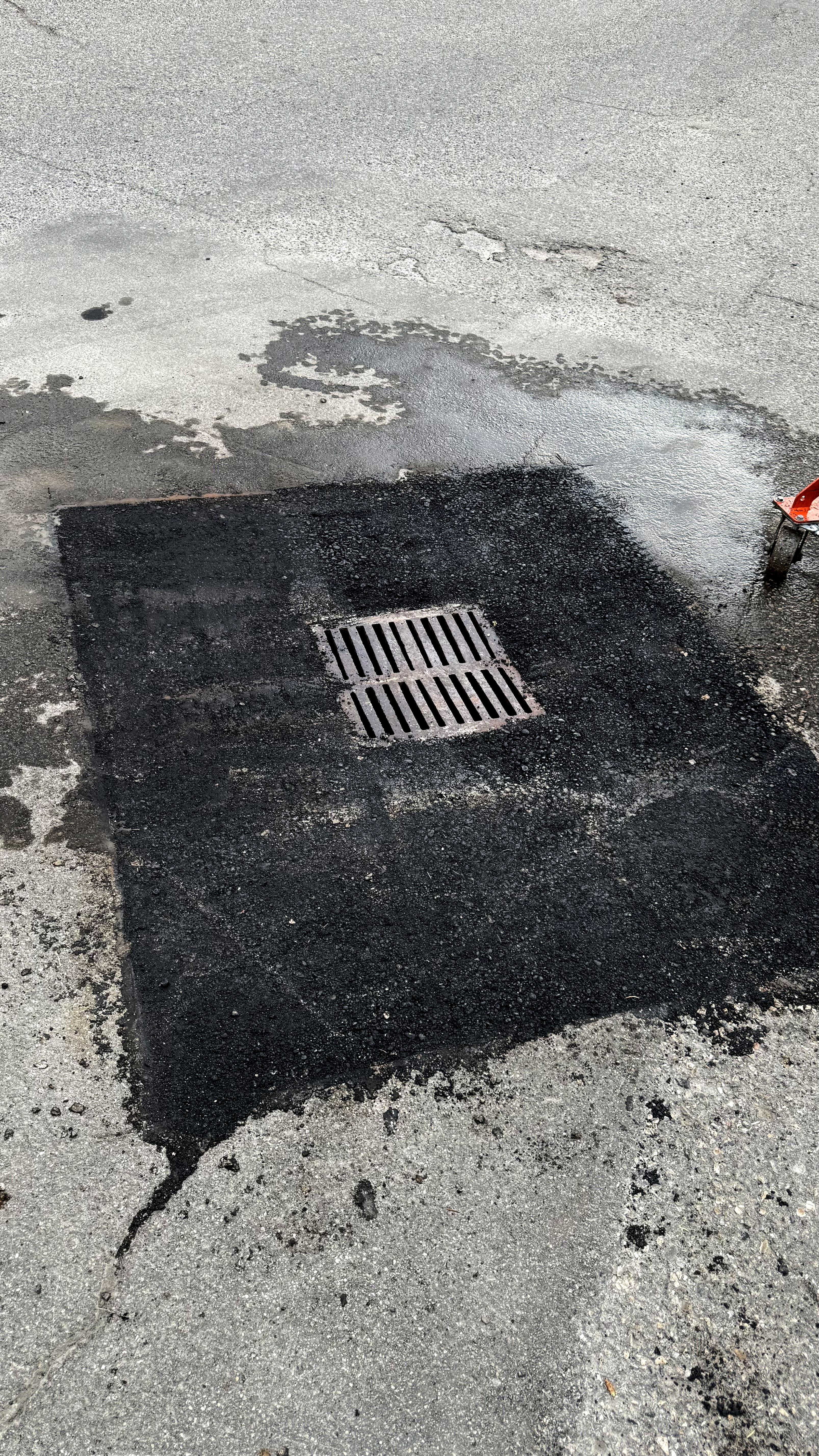 Storm Drain Patch — Commercial Parking Lot