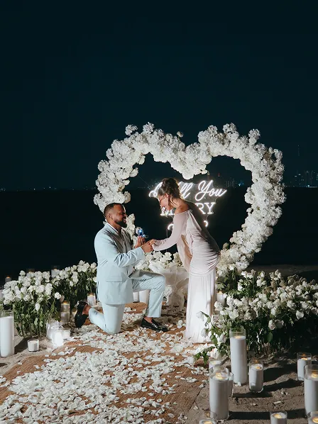 Joyful Dubai engagement captured by Candid With Jay on the beach
