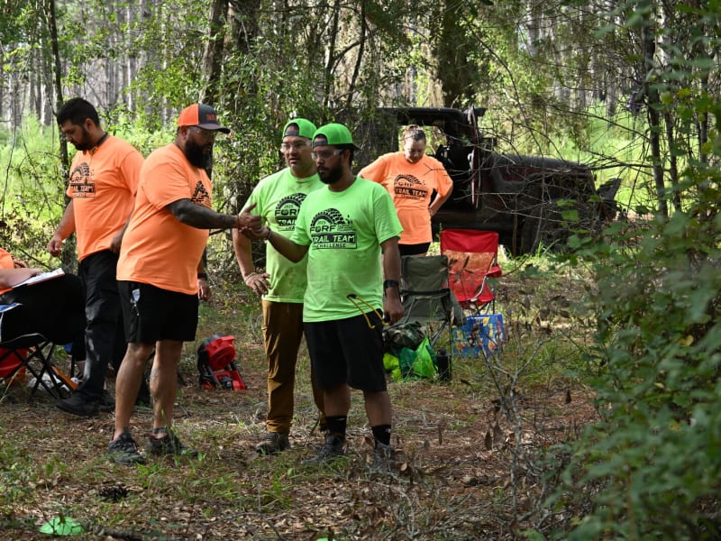 Rigs lined up at camp during a break in the action