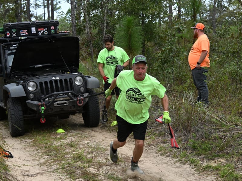 Pushing through dense brush and narrow trails