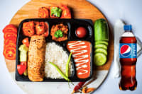 Deluxe veg thali + pepsi (250ml)