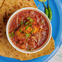 Chicken tikka masala with tawa parathas