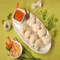 Veg cheese burst steam momo