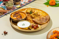 Chicken Biryani And Butter Chicken Meal