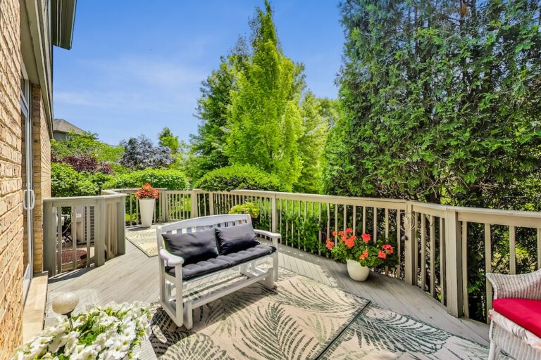 home for sale 2527 Stonebridge Ln Northbrook IL deck surrounded by greenery