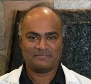 Dr. Schenley Poliah, dentiste, LifeSmiles Dental - Grant Park Mall - Photo portrait