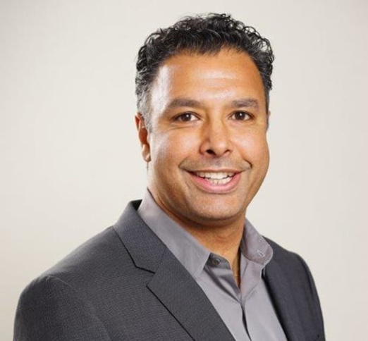 Dr. Jin Grewal, Dentist in Foxcreek Dental - Portrait Photo