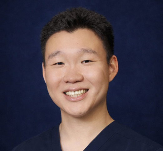 Dr. Elvis Kuan, Dentist in Peace Country Dental Clinic - Portrait Photo