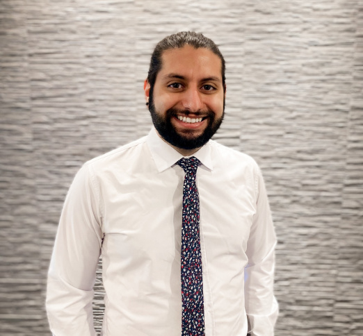 Dr. Rahbar, Dentist in Warmstone Family Dentistry - Portrait Photo