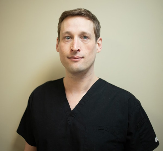 Dr. Tyler Hill, Dentist in Melfort Dental Group - Portrait Photo