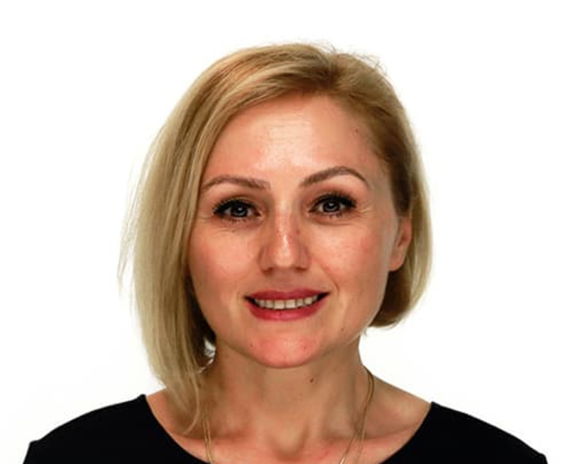 Dr. Adela Coku