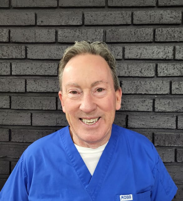 Dr. Denis Dwyer, Dentist in Monarch Dental - Portrait Photo