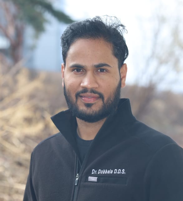 Dr. Kartheek Dobbala, Dentist in Brentwood Dental Centre - Portrait Photo