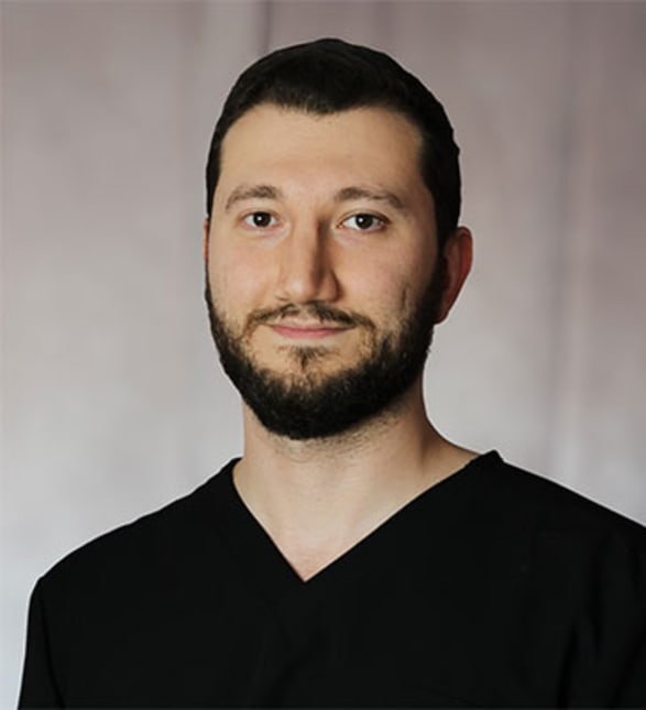 Dr. Subhei Kazkaz, Dentist in Main Street Dental - Portrait Photo